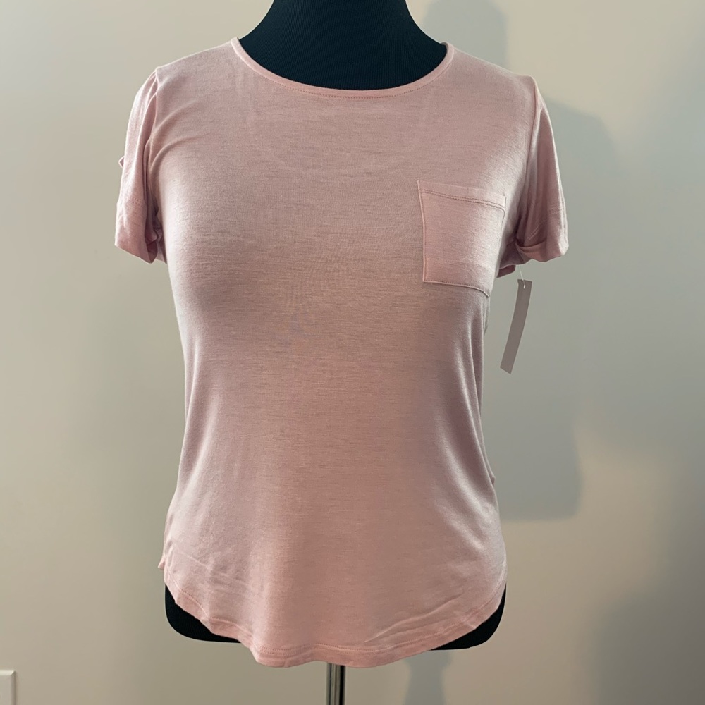 Super cute, open back blush colored blouse!